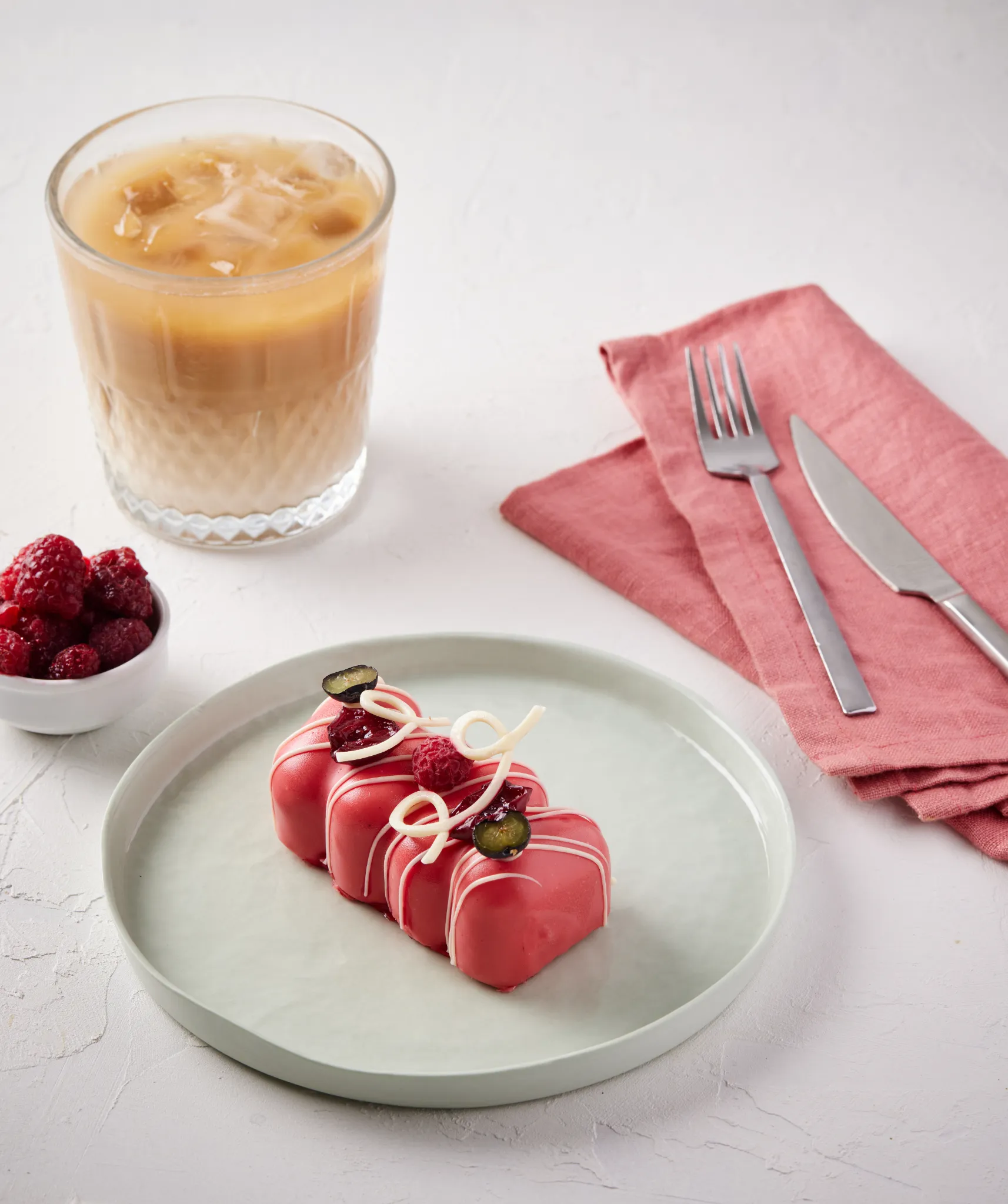 Atlanta food styling and photography — raspberry petit gateau with iced latte